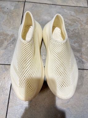 adidas Women’s Slip-On Knit Sneakers in Cream